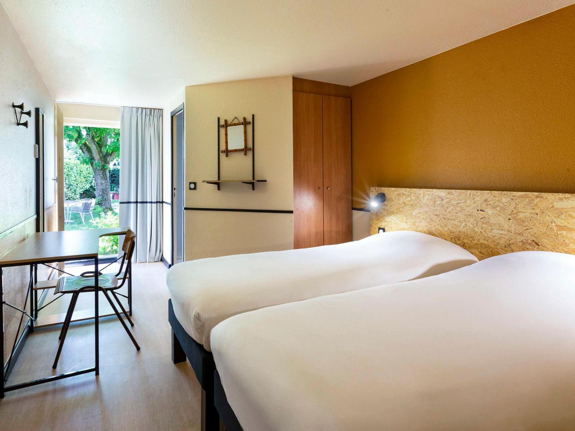 Greet Hotel Villeneuve La Garenne - Renove Eksteriør billede