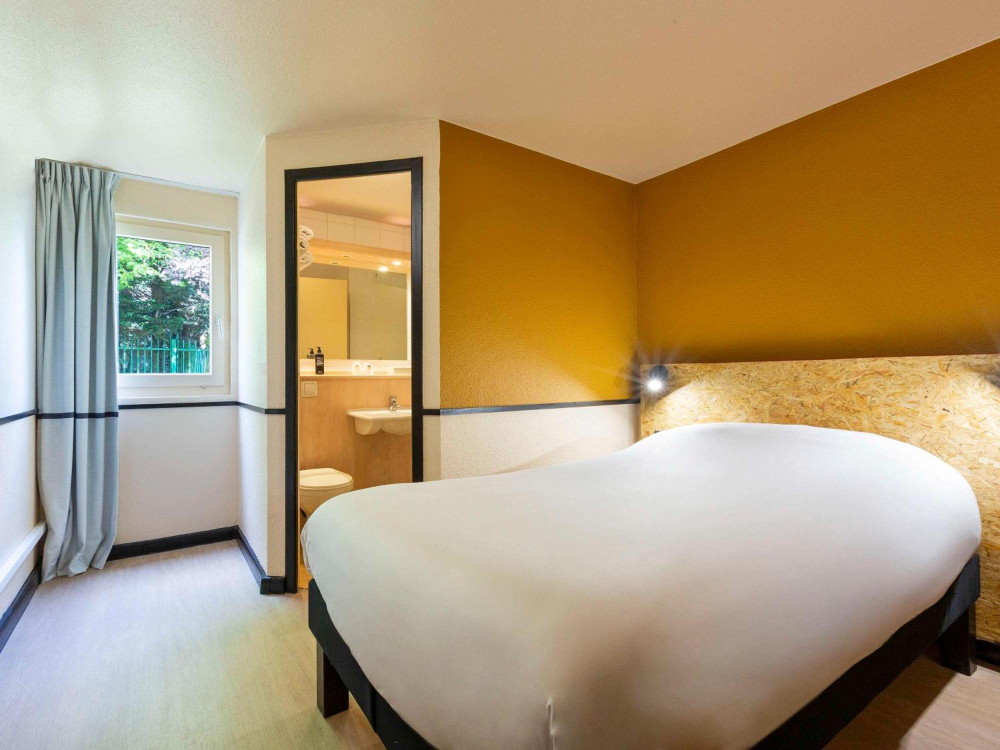 Greet Hotel Villeneuve La Garenne - Renove Eksteriør billede