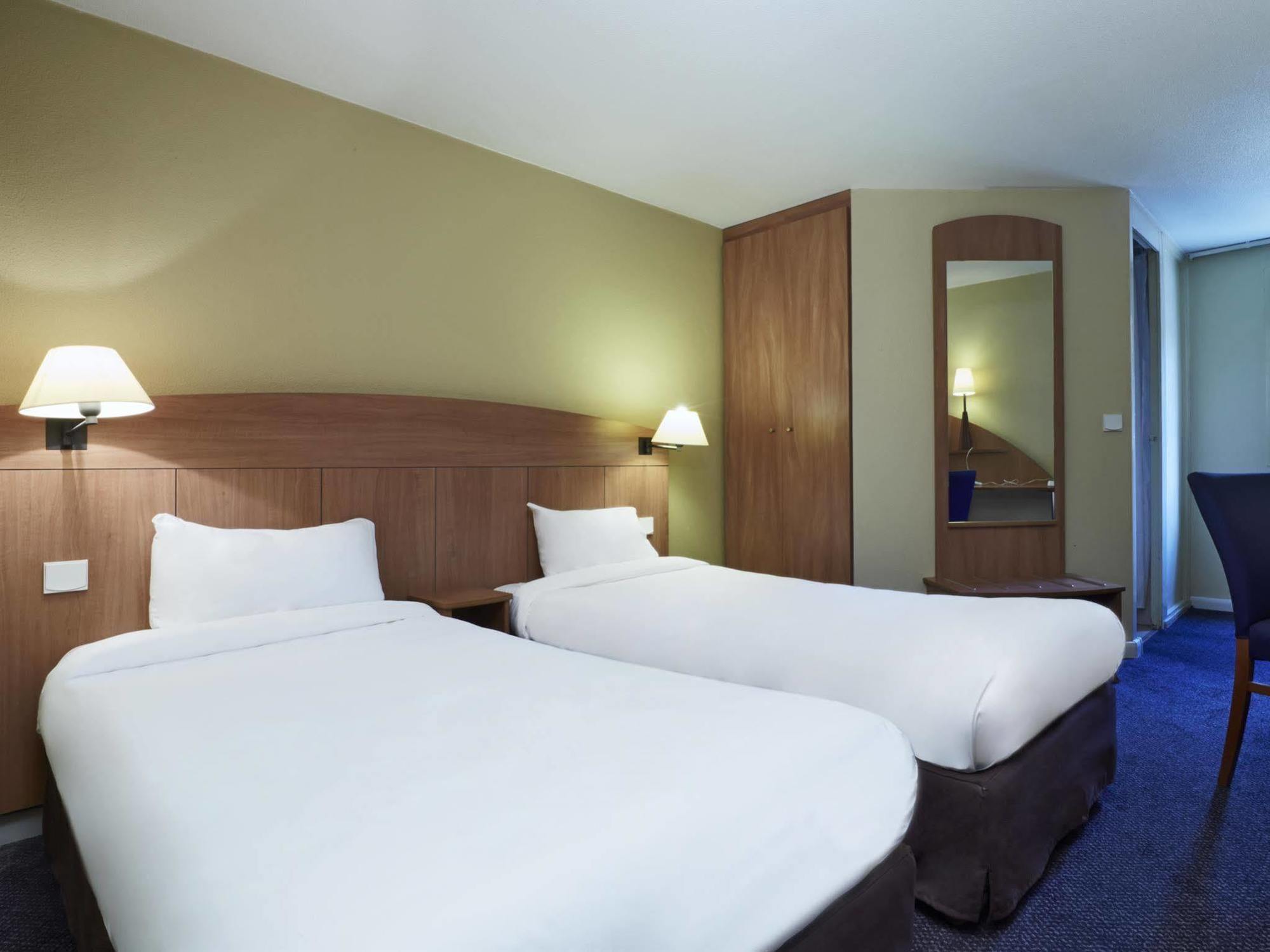 Greet Hotel Villeneuve La Garenne - Renove Eksteriør billede